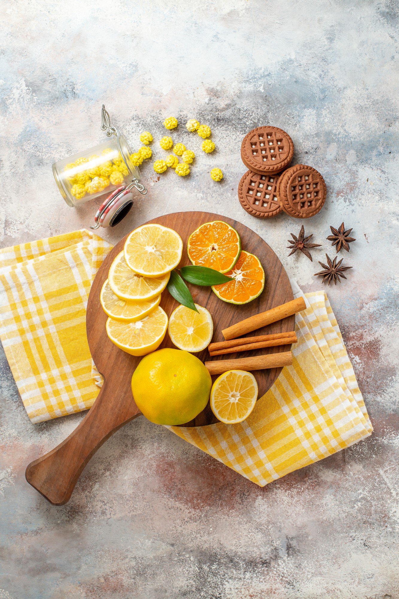 Overhead of plated main with citrus and herbs, rustic cloth